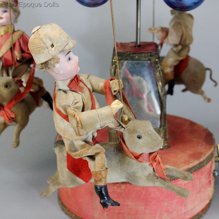 mechanical toy Christmas  , antique jockey carousel