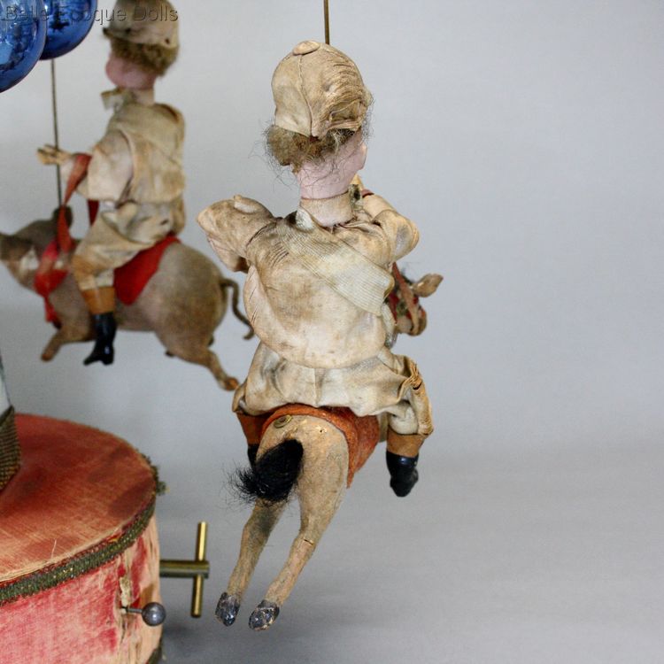 mechanical toy Christmas  , antique jockey carousel