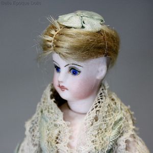 French bisque mignonette with jointed elbows , antique all bisque doll sustrac ,  